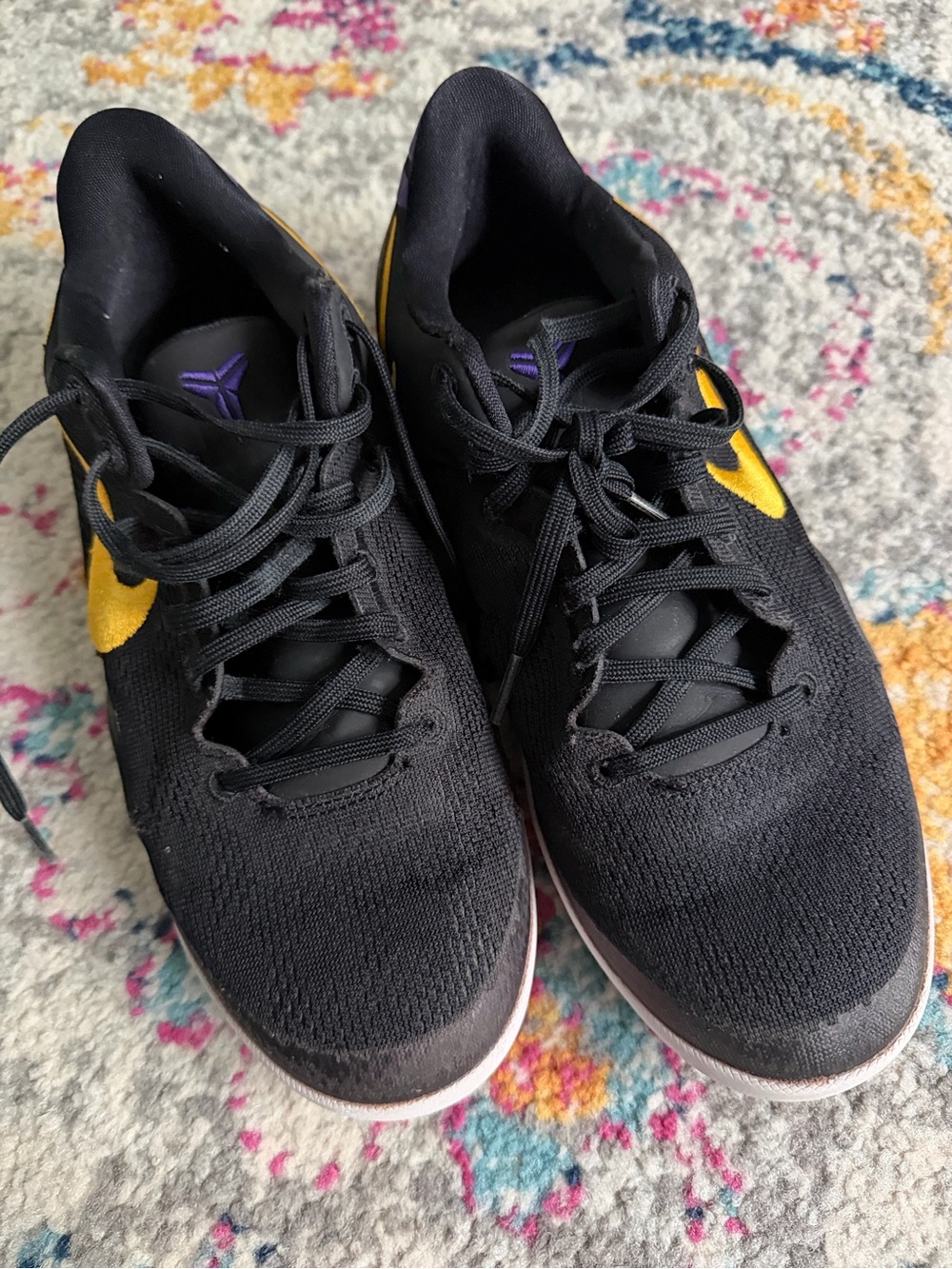 Nike Black Athletic Sneakers with Yellow Swoosh and Purple Logo